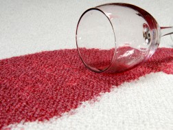 red wine spilled on white carpet