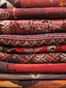 stack of Oriental area rugs